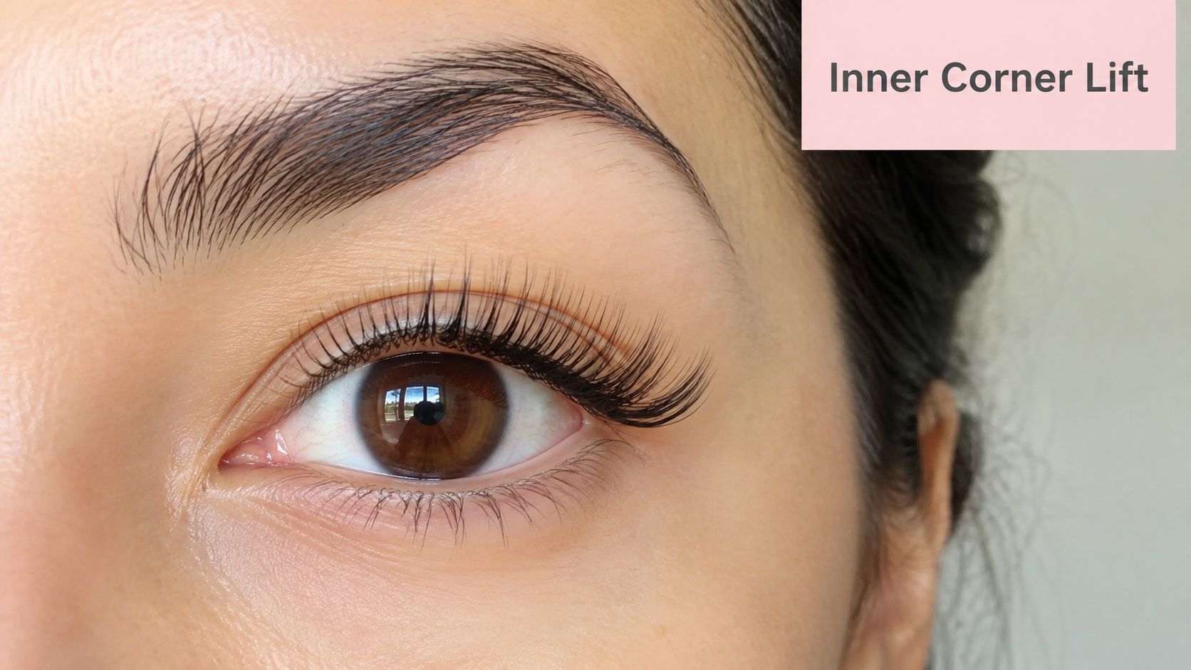 7 Lash Extension Styles for Hooded Eyes in Sydney 10 A close-up view of an eye showing a lash extension style designed to create an inner corner lift.