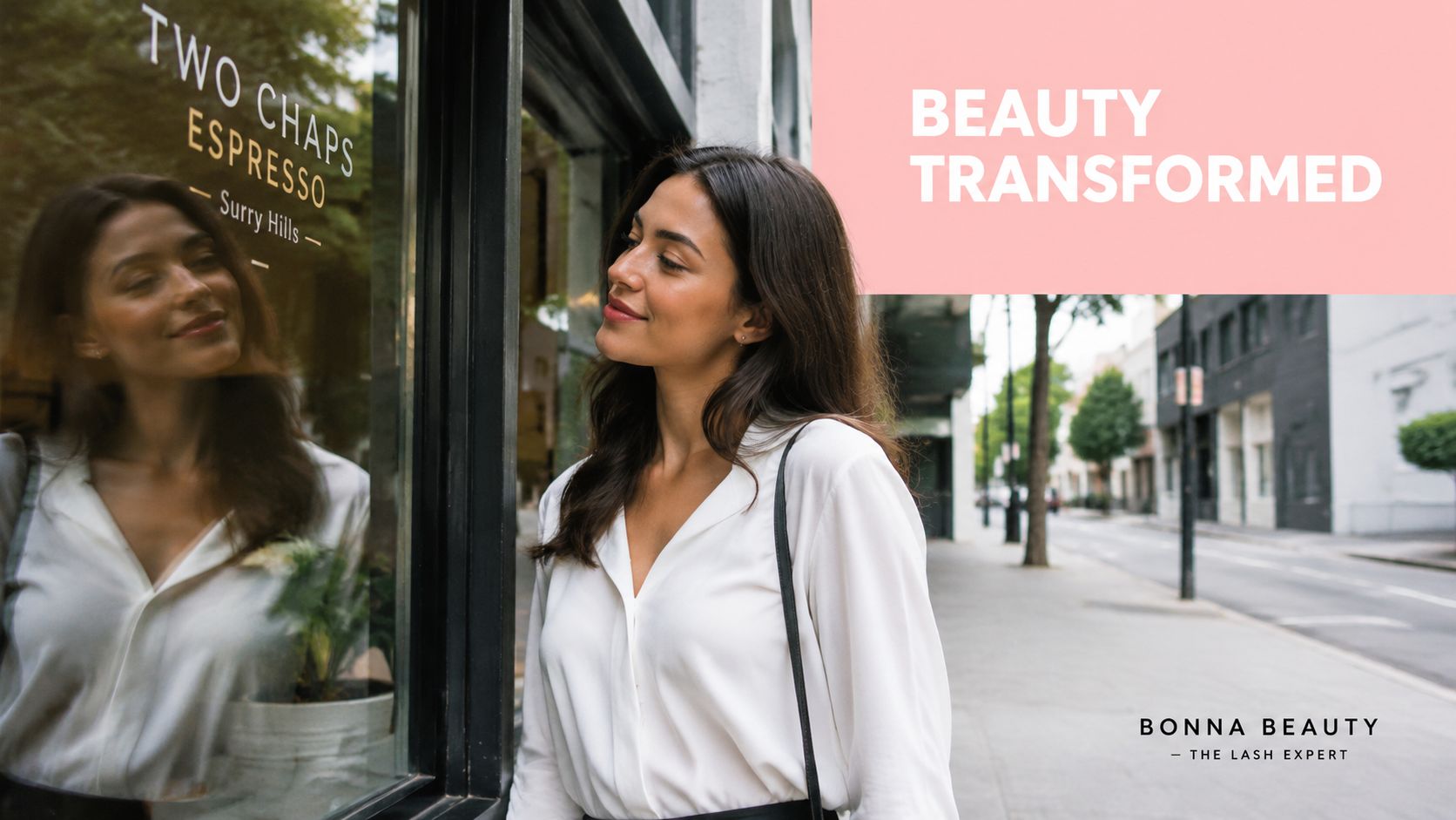 Russian Lashes Extensions: The Complete Sydney Guide 6 A woman with long dark hair smiles while looking into the window of a shop front.