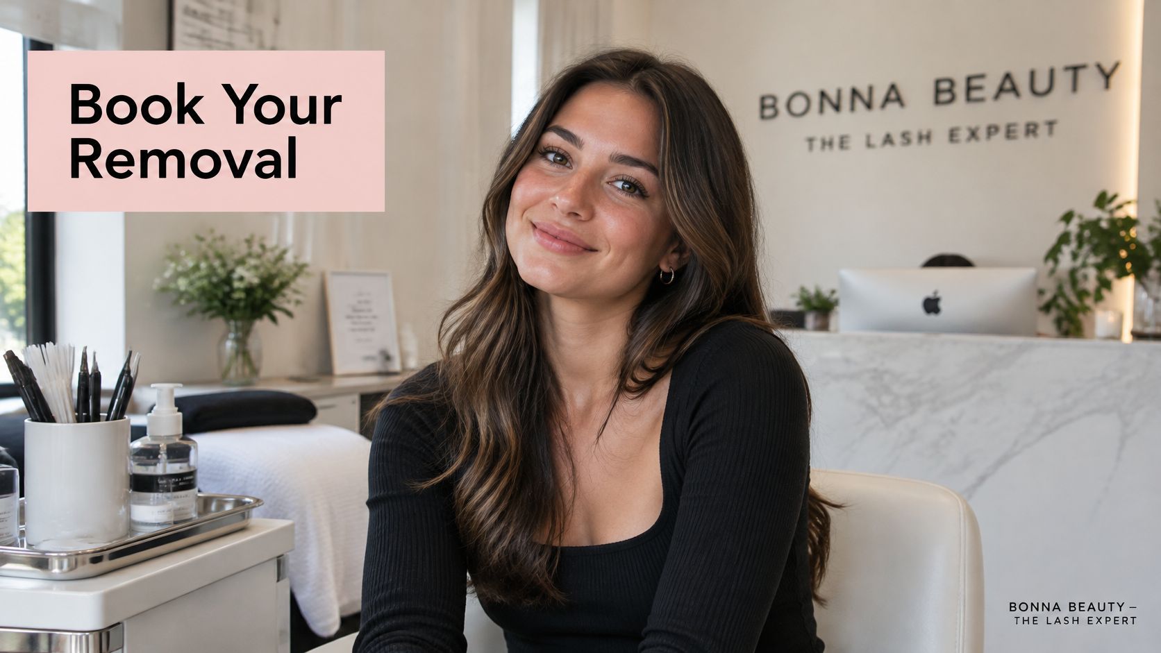 Lash Extension Removal Guide: Safe Steps, Costs and Risks 7 A professional beauty technician at Bonna Beauty smiling, promoting a lash extension removal service appointment.